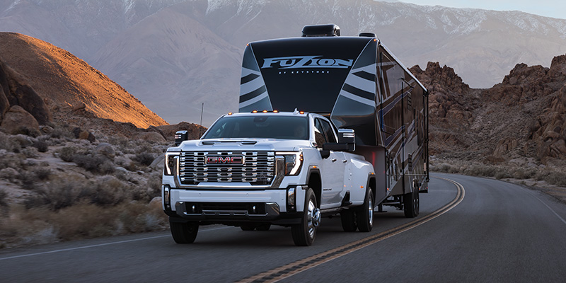 2025 GMC Sierra HD Towing a Camper Trailer